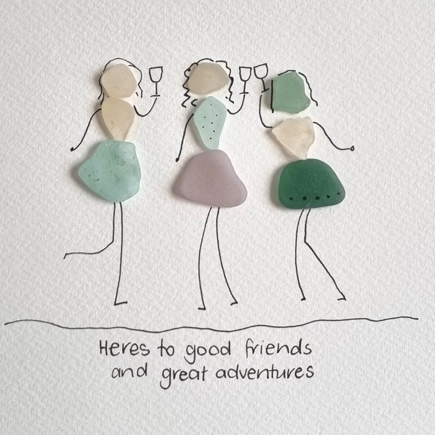 Seaglass artwork of three friends with wine