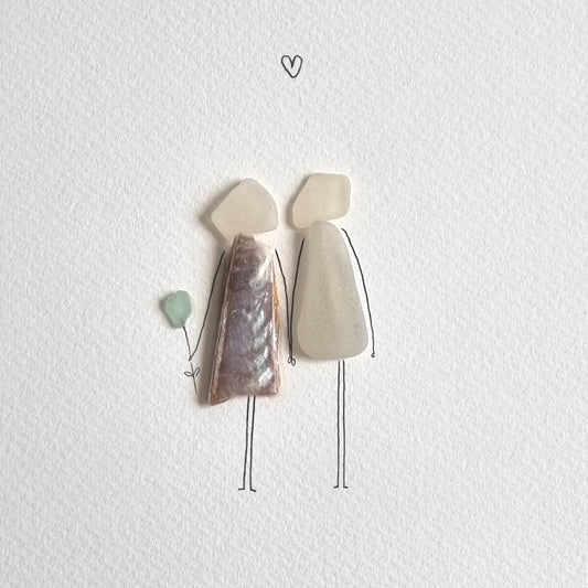 Seaglass artwork of a couple in love